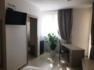 TV a/nebo společenská místnost v ubytování Residenza S.Event B&B