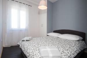 Un pat sau paturi într-o cameră la Apartment Sebalj