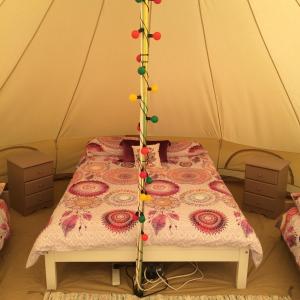 Ένα ή περισσότερα κρεβάτια σε δωμάτιο στο Cong Glamping