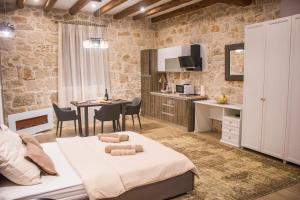 Η κουζίνα ή μικρή κουζίνα στο Apartmens Melisa