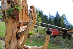 A garden outside Familyparadies GAMPLALM