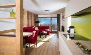 A seating area at Familyparadies GAMPLALM
