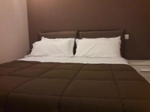 A bed or beds in a room at Villa Sofia