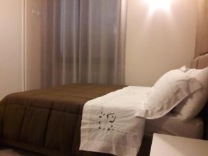 A bed or beds in a room at Villa Sofia