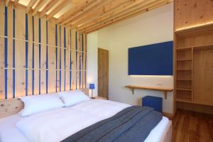 Posteľ alebo postele v izbe v ubytovaní Chalet Alm Planai
