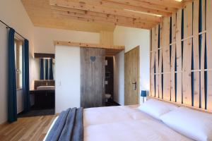 Posteľ alebo postele v izbe v ubytovaní Chalet Alm Planai