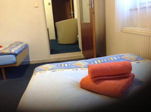 A bed or beds in a room at Privat Monika