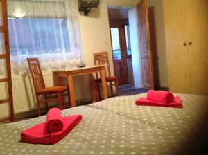 A bed or beds in a room at Privat Monika