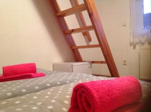 A bed or beds in a room at Privat Monika