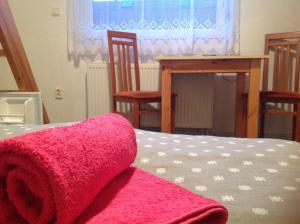 A bed or beds in a room at Privat Monika