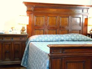 A bed or beds in a room at Classic Hotel