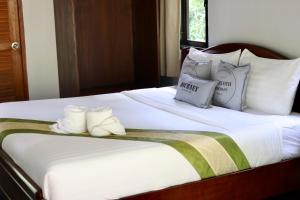 Ein Bett oder Betten in einem Zimmer der Unterkunft Plawan Lipe Resort