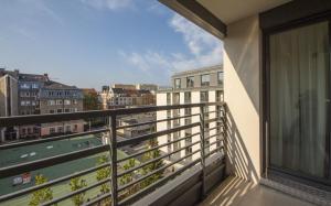 a balcony with a view of a city at Mariacka Old Town Apartments in Szczecin