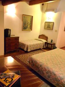 A bed or beds in a room at Classic Hotel