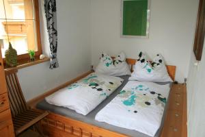 A bed or beds in a room at Ferienwohnung Felix-Adults Only