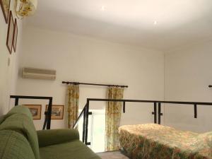 A bed or beds in a room at Classic Hotel