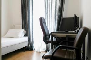 A bed or beds in a room at Kazaviti SKG