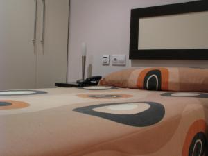 Posteľ alebo postele v izbe v ubytovaní Hotel Elizalde