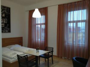 Letto o letti in una camera di Hotel Aton