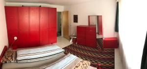 Кровать или кровати в номере Apartment Center Zermatt