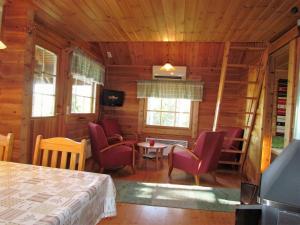 Posezení v ubytování Ukonloma Cottages