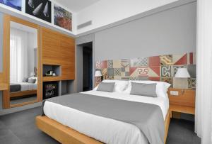 Postel nebo postele na pokoji v ubytování Hotel Medinblu