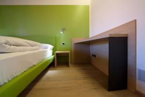 Postel nebo postele na pokoji v ubytování Agritur I Colori