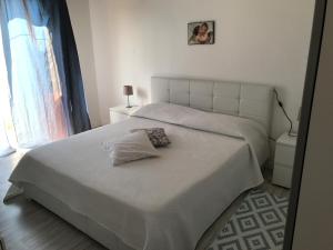 Postel nebo postele na pokoji v ubytování GiorGiada