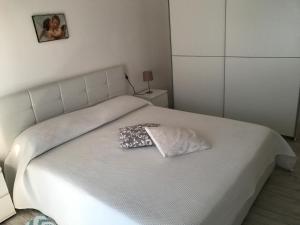 Postel nebo postele na pokoji v ubytování GiorGiada