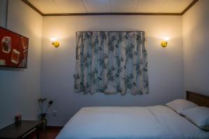 Postel nebo postele na pokoji v ubytování Mount Mary Inn