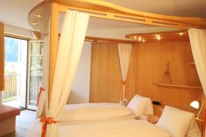 Ένα ή περισσότερα κρεβάτια σε δωμάτιο στο Hotel Restaurant GABRIEL