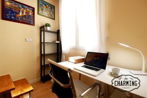 Telewizja i/lub zestaw kina domowego w obiekcie Plaza Mayor - Exclusivo Apartamento Dúplex