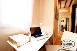 Telewizja i/lub zestaw kina domowego w obiekcie Plaza Mayor - Exclusivo Apartamento Dúplex