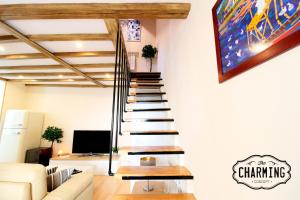 Telewizja i/lub zestaw kina domowego w obiekcie Plaza Mayor - Exclusivo Apartamento Dúplex