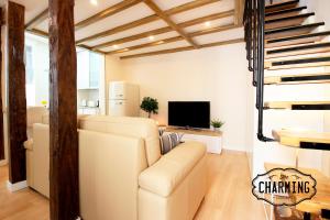 Telewizja i/lub zestaw kina domowego w obiekcie Plaza Mayor - Exclusivo Apartamento Dúplex