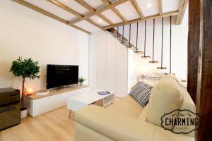 Telewizja i/lub zestaw kina domowego w obiekcie Plaza Mayor - Exclusivo Apartamento Dúplex