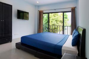 Cama o camas de una habitación en Superpro Samui