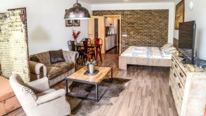 Posezení v ubytování Apartment Říčky V Orlických Horách + 37 fotografií