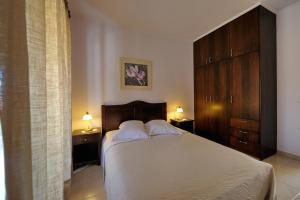 Кровать или кровати в номере Dianthos Guesthouse