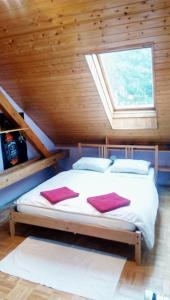 Postel nebo postele na pokoji v ubytování Apartman pod Svatou Horou