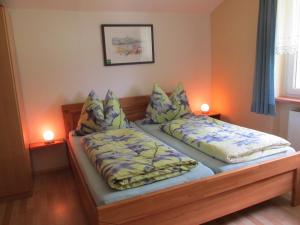 A bed or beds in a room at Ferienhaus Annenheim