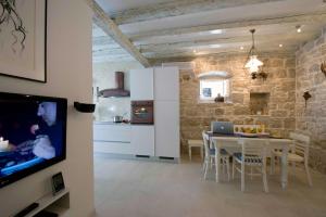 Kuchyň nebo kuchyňský kout v ubytování Apartment Whooart