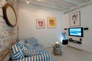 TV a/nebo společenská místnost v ubytování Apartment Whooart