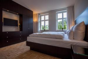 Postel nebo postele na pokoji v ubytování Residenz Itterbach