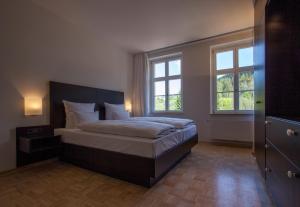 Postel nebo postele na pokoji v ubytování Residenz Itterbach