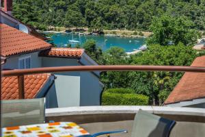 a view of a river from the balcony of a house at Apartments villa MaVeRo in Banjole