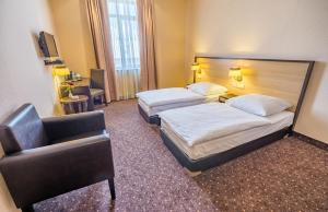 Rúm í herbergi á Hotel Lomsia