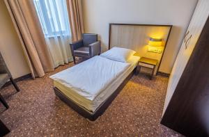 Rúm í herbergi á Hotel Lomsia