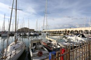 a bunch of boats docked in a harbor at B&B Soggiorno Di Ostia in Lido di Ostia