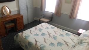 Postel nebo postele na pokoji v ubytování Havelock Guesthouse